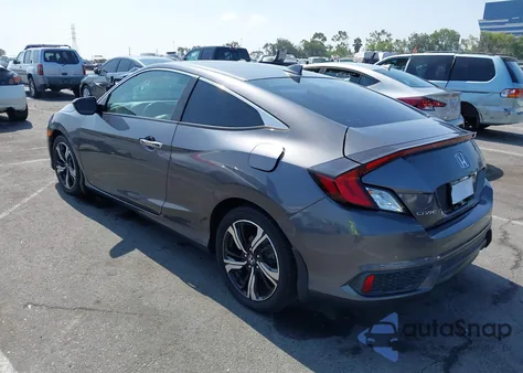2016 Honda Civic Touring z USA, uszkodzony, nr VIN 2HGFC3B9XGH359765